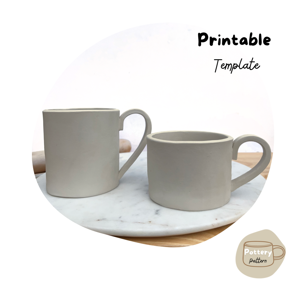 two handmade pottery mugs crafted using printable pottery templates. Displayed on a marble surface, these ceramic mugs feature sleek handles and smooth edges, ideal for DIY pottery project. Perfect for creating pottery projects at home. 